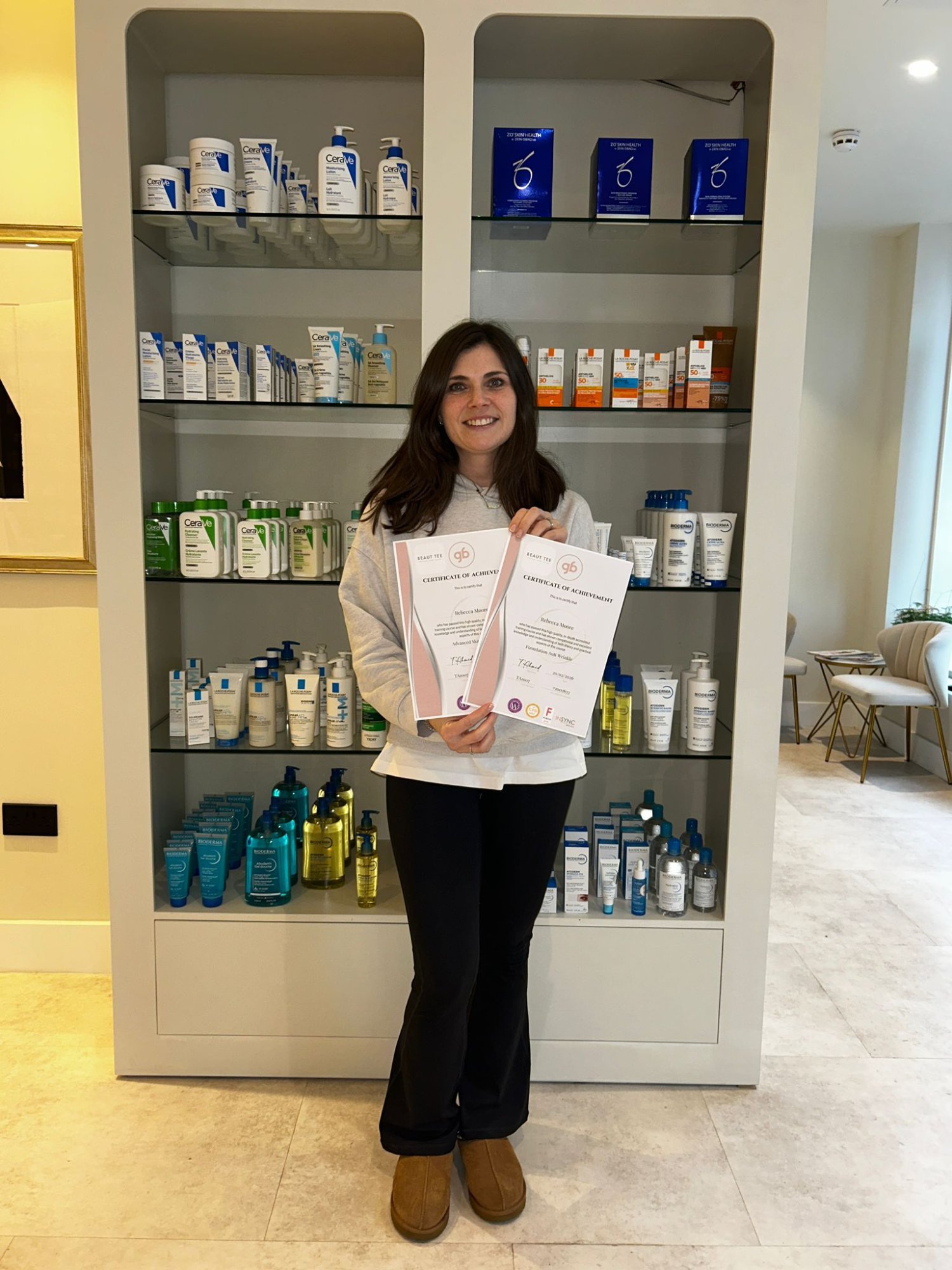 Rebecca Moore with certificates